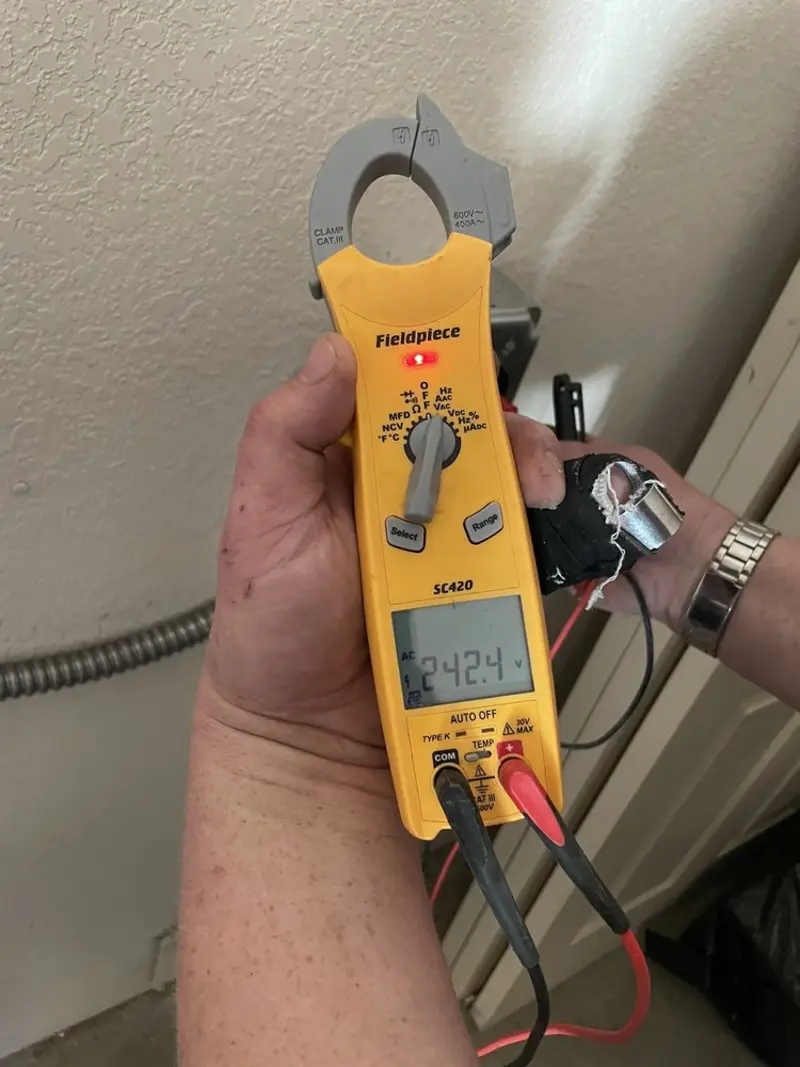 Voltage testing with clamp meter during Aluminum Wiring Replacement in Sahuarita